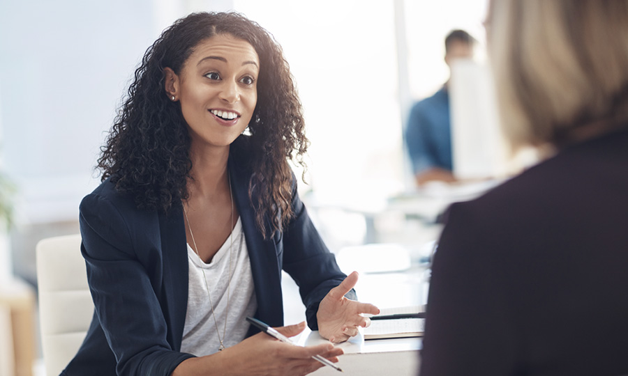 image_woman-business-meeting_900x540px Woman in a business meeting talking with a client