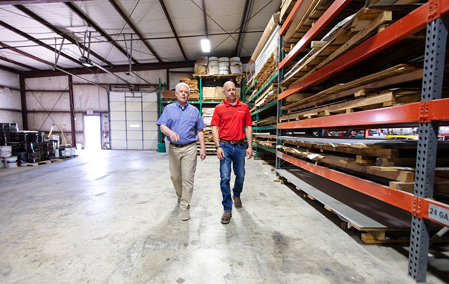 Kevin and Andy in one of the Wray Roofing warehouses